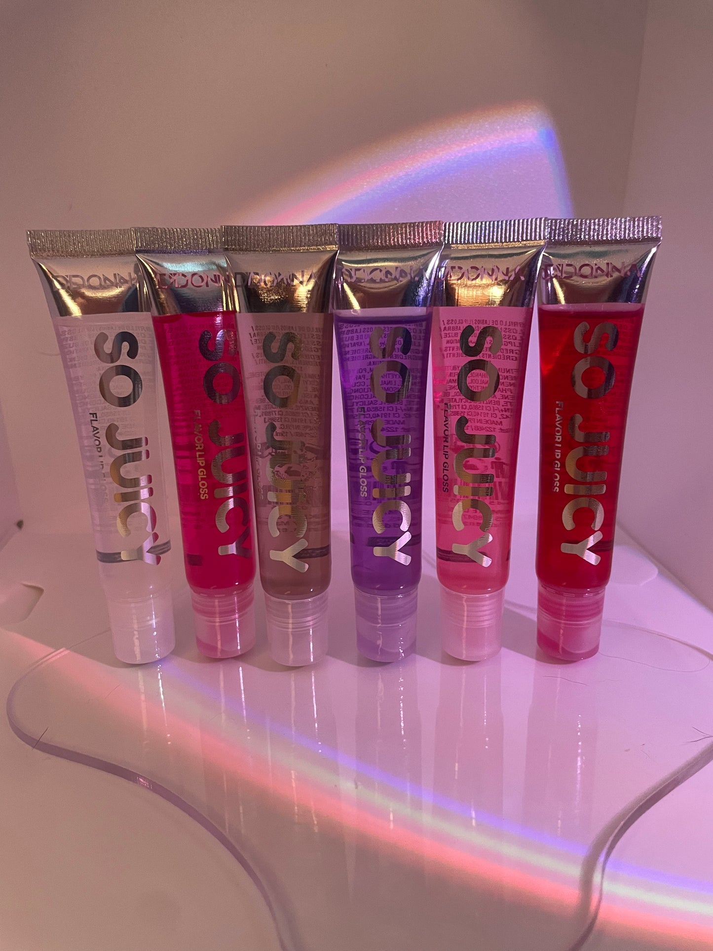 Pack of fruity and colorful lip glosses